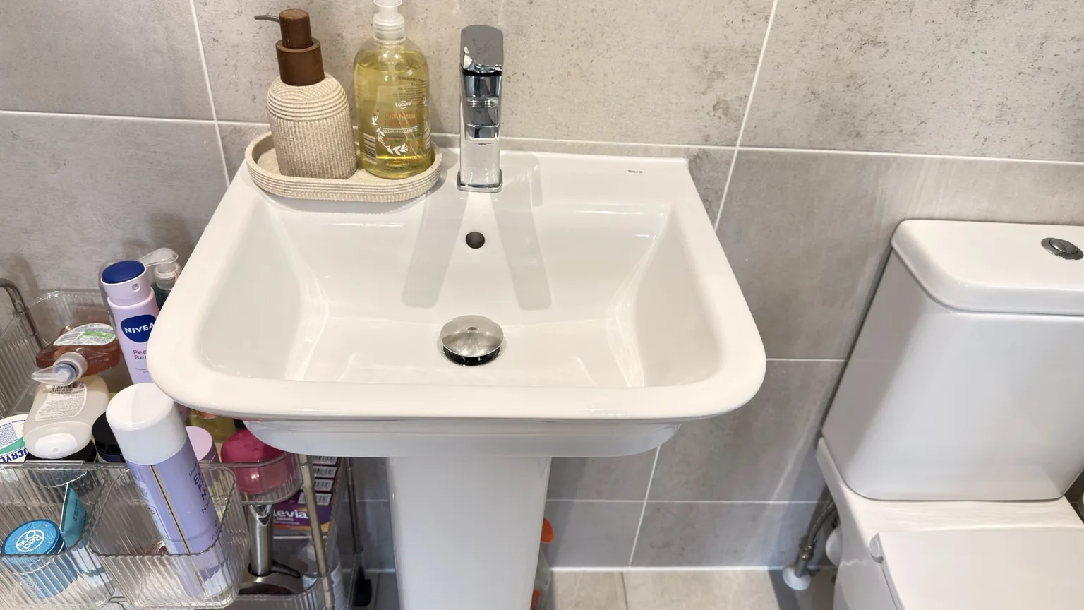 Clean basin, taps and toilet after RASO bathroom cleaning