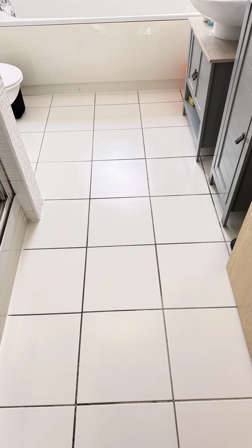 Clean tiled bathroom floor after professional RASO cleaning
