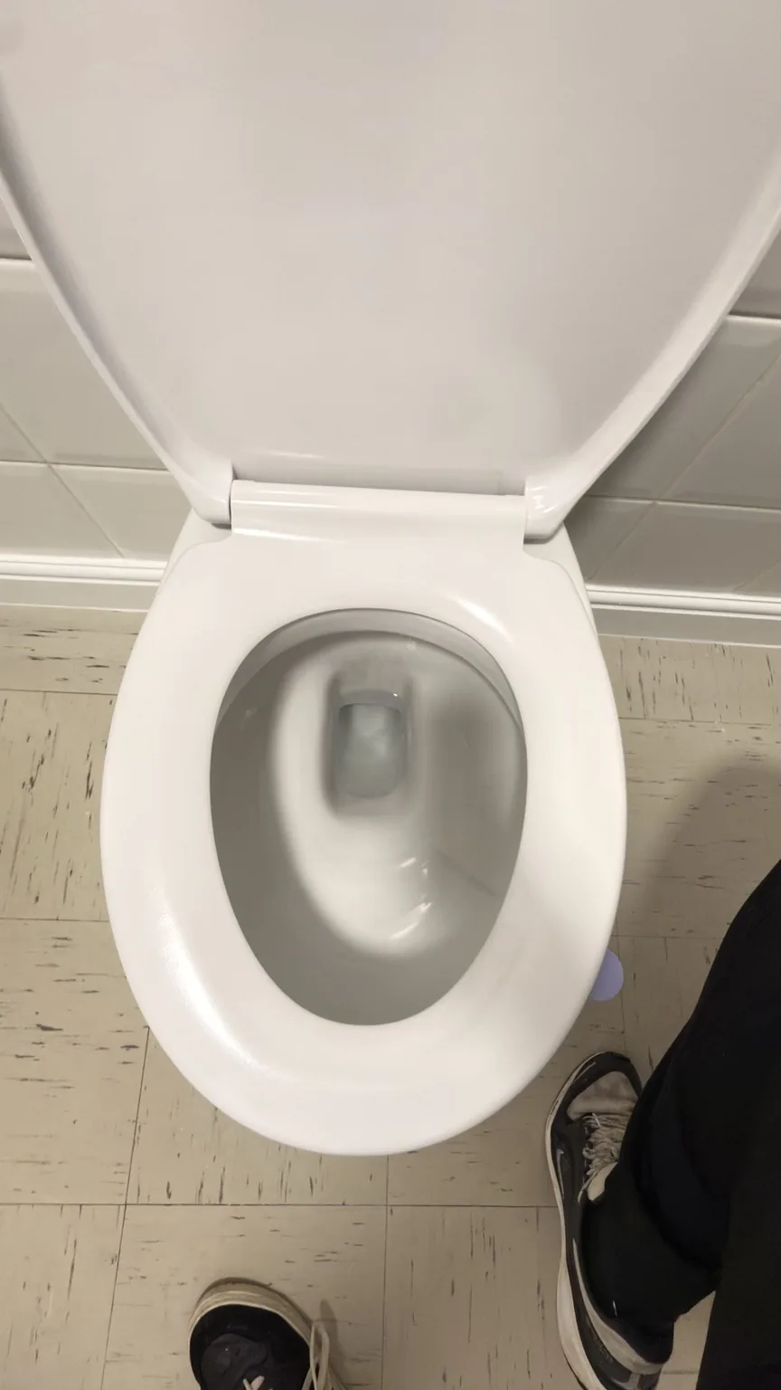 Clean toilet after detailed bathroom cleaning by RASO Cleaning Service