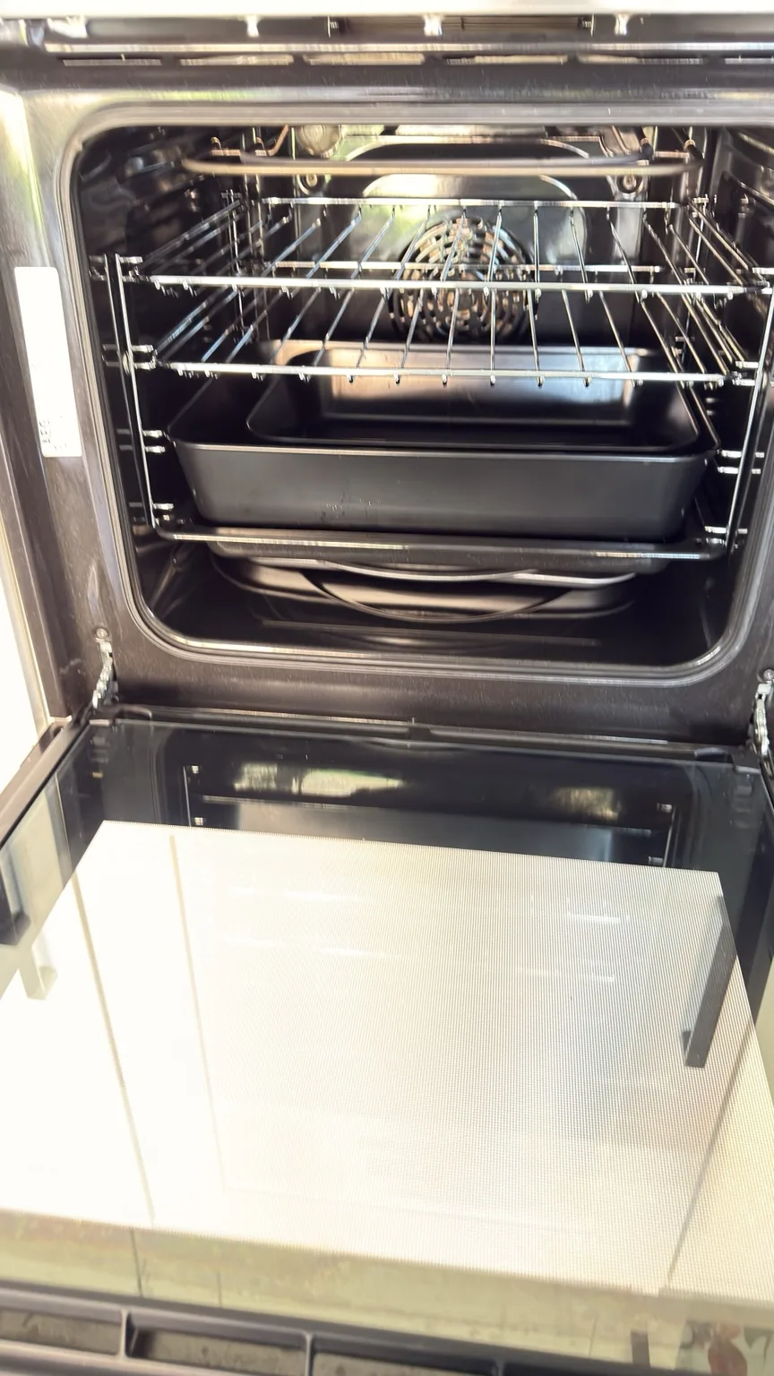 Clean oven interior, racks and trays after RASO oven cleaning