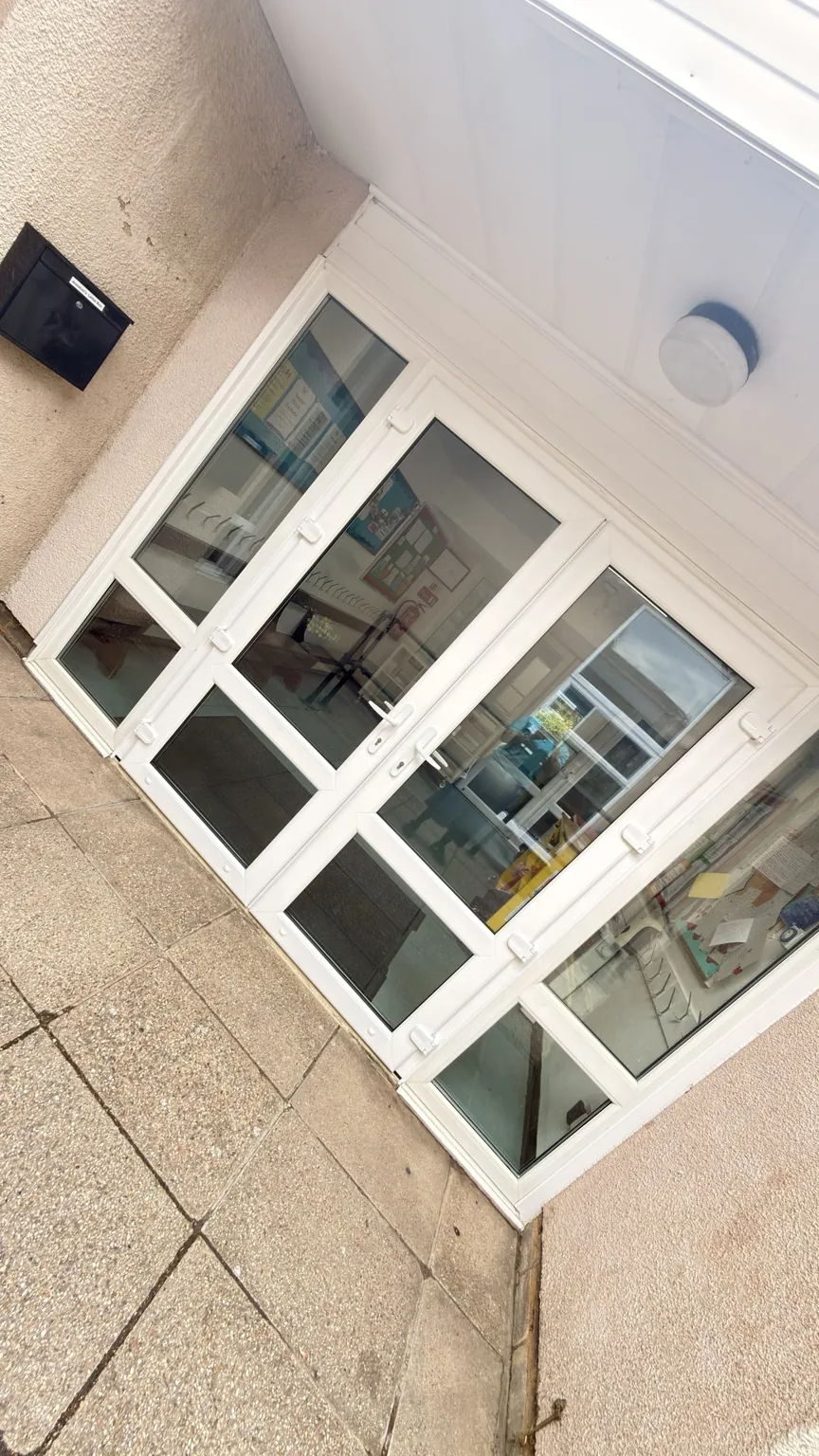 Clean school entrance glazing and doors after RASO commercial cleaning