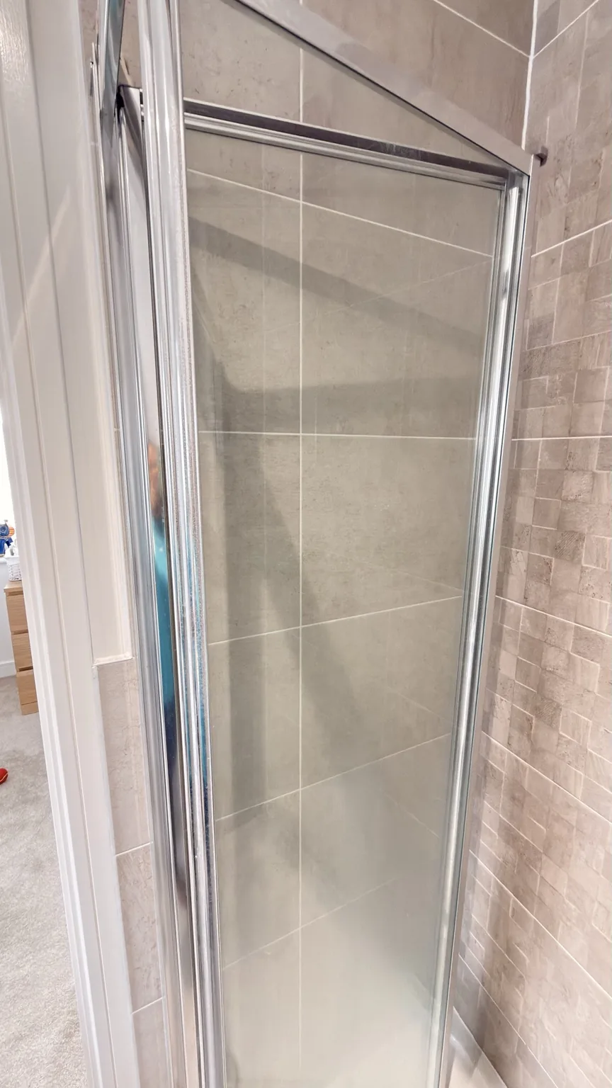 Clean shower glass and tiled enclosure after RASO cleaning
