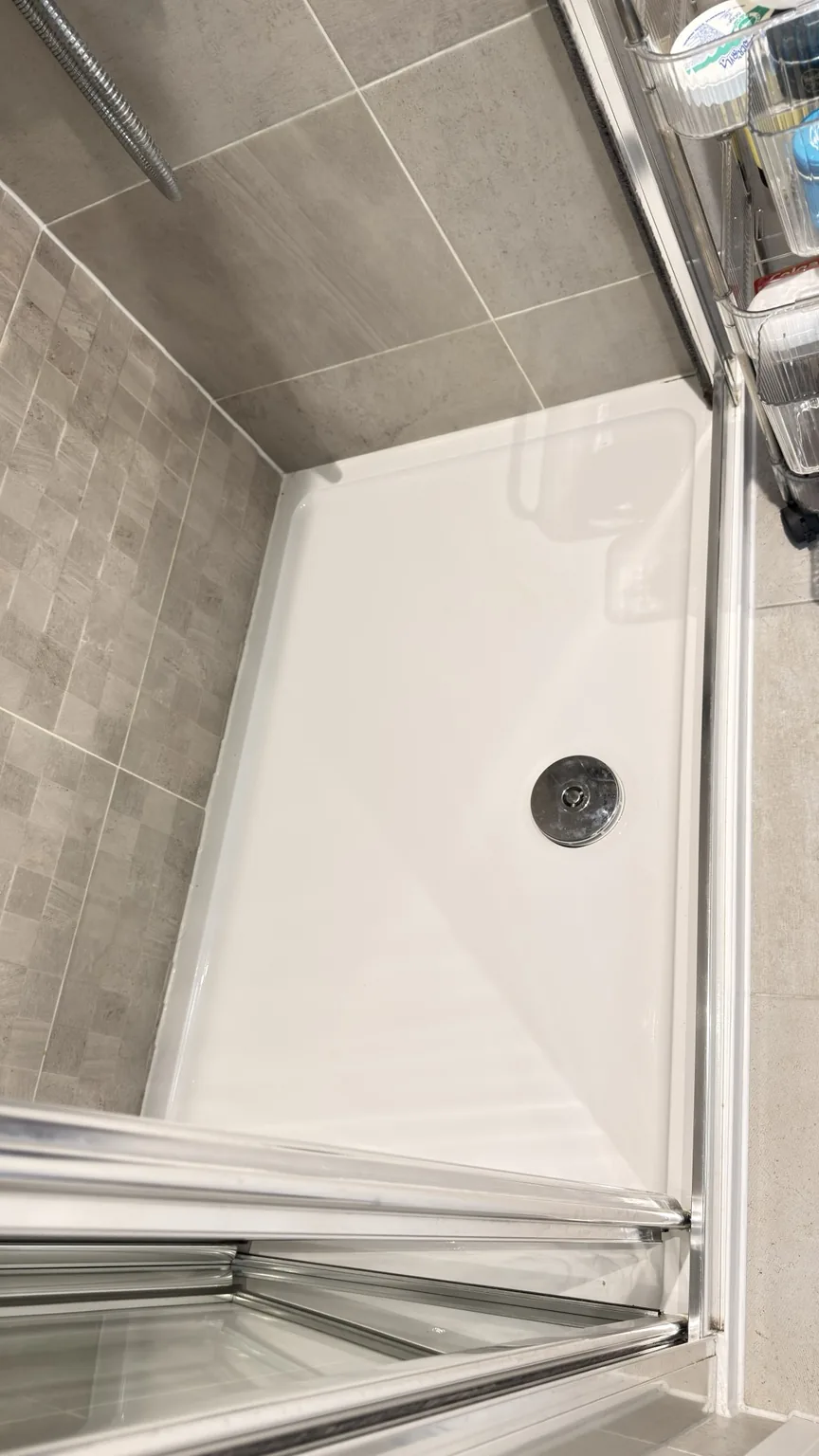 Clean shower tray and tiled surround after RASO cleaning