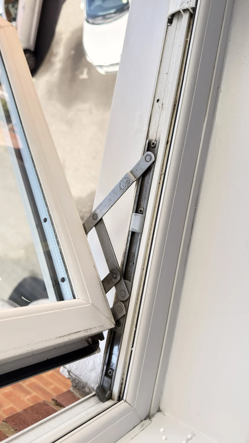 Window frame detail before professional cleaning
